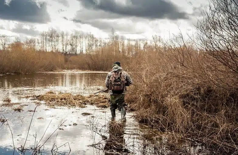 hunter in a swamp